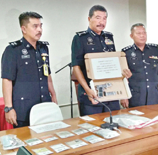 S'kan armed grab: Three  held, hunt for another 